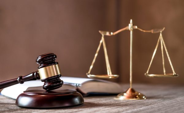 scales-justice-gavel-wooden-table-agreement-courtroom